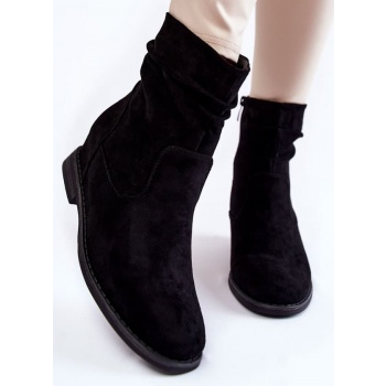 fashionable suede boots on a hidden σε προσφορά