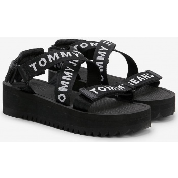 black women`s sandals on the tommy