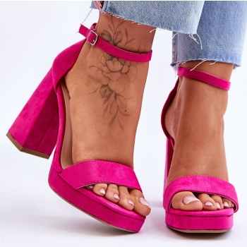 fashionable suede sandals on a square σε προσφορά