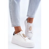  white women`s sneakers with celedria decoration
