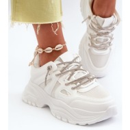  women`s sneakers on a massive sole with decorative lacing white relissa