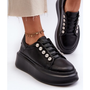 women`s leather sneakers on a solid σε προσφορά