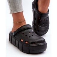  women`s foam slippers on a black itubia platform