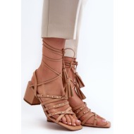  lace-up low-heeled sandals decorated with camel chrisele studs