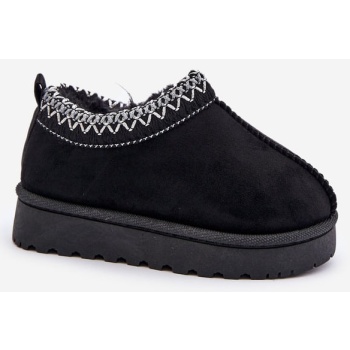 children`s ankle snow boots on a