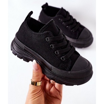 children`s sneakers on a platform black