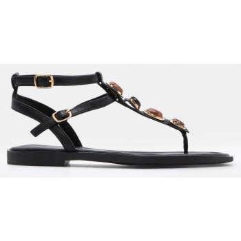 flat σανδάλια με διακοσμητικές πέτρες  σε προσφορά